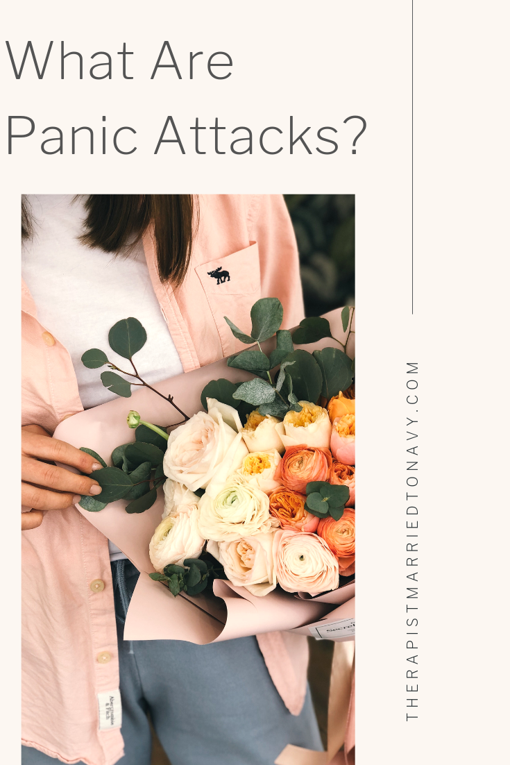 Lady holding a bouquet of flowers